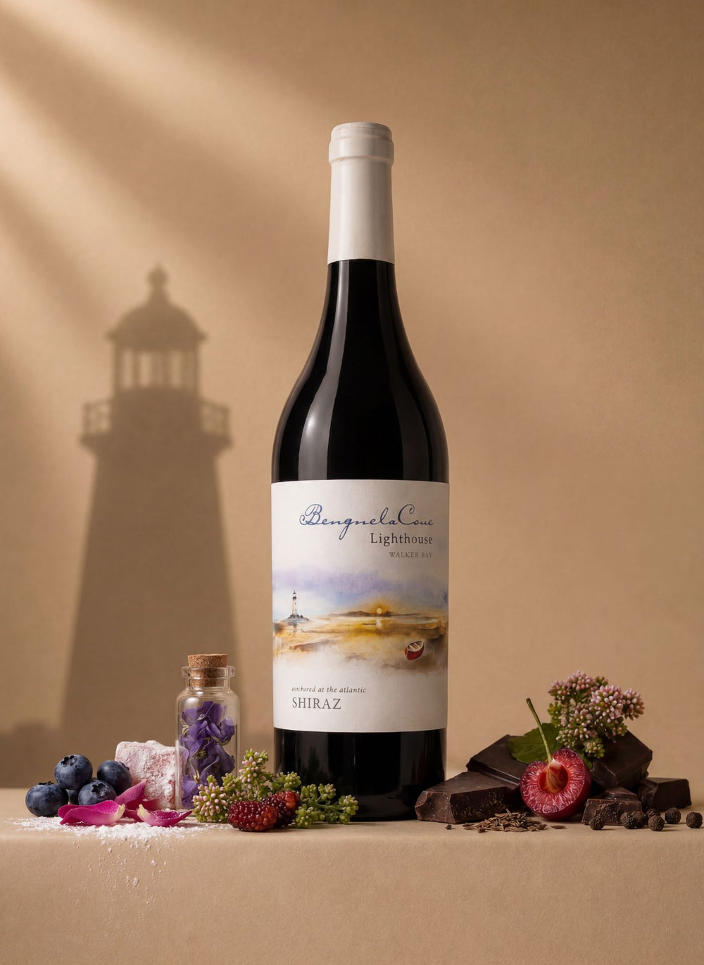 Bottle of wine with a scenic label on a beige background with decorative elements.