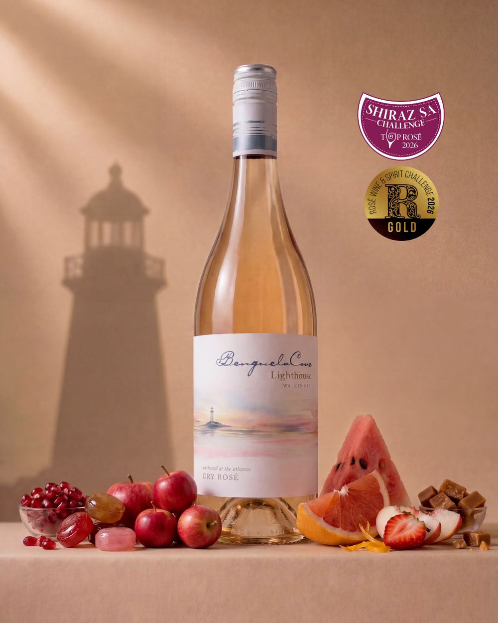 Bottle of wine with a lighthouse silhouette and fruit on a beige background