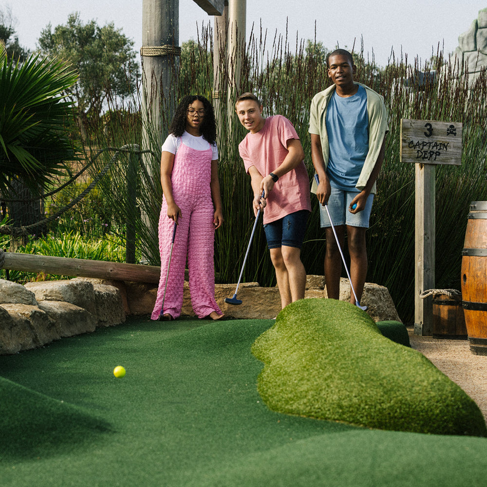 Pirate Adventure Golf course with treasure chests and pirate ships